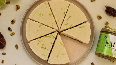 Key lime pie with a jar of JEM Organics Pistachio Ginseng Cashew Butter