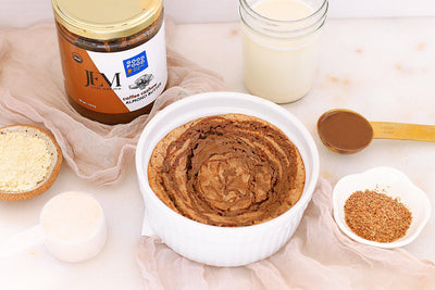 Coffee Cake in a mug next to JEM Organics Coffee Cashew Almond Butter