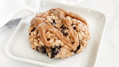 Oatmeal cookies drizzled with almond butter.