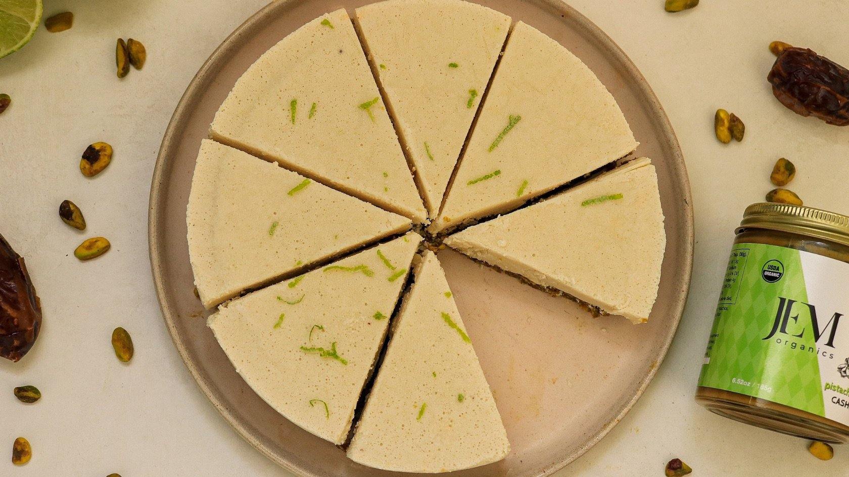 Key lime pie with a jar of JEM Organics Pistachio Ginseng Cashew Butter
