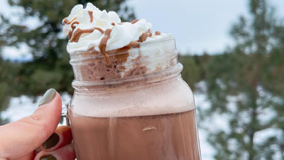 Hot chocolate outside with whipped cream