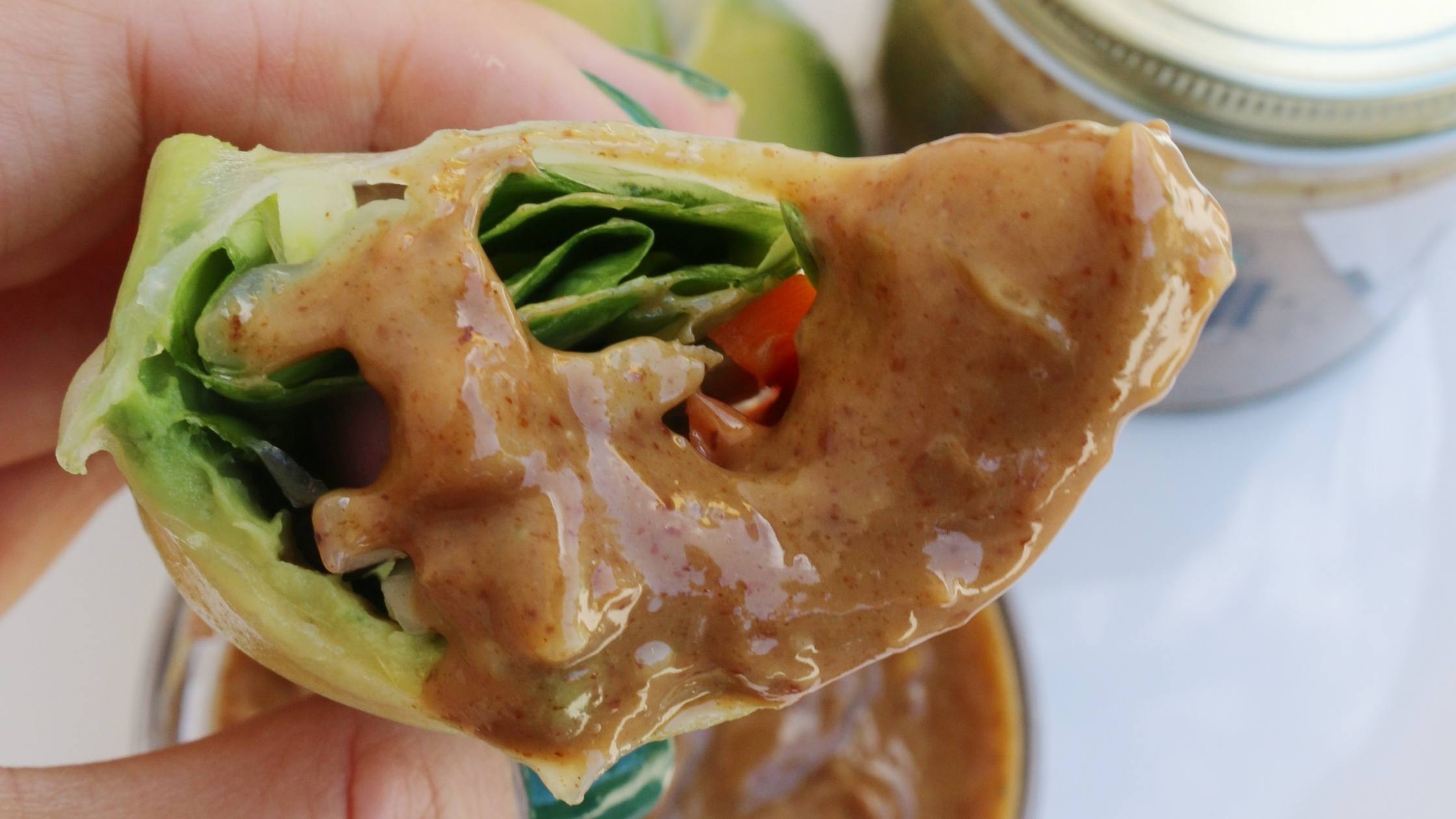 Spring roll dipped in almond butter sauce